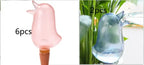 Bird-shaped self-watering globes for plants, pink and blue, shown in packs of 6 and 2.