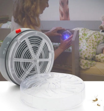 Air purifier with a person using a smartphone in the background