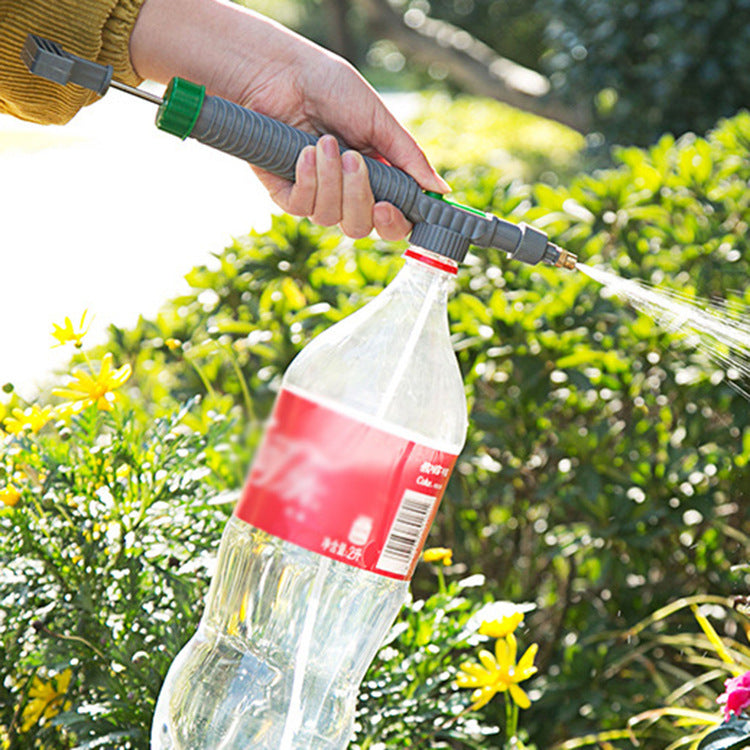 Adjustable bottle watering sprayer nozzle for easy garden and plant care, featuring a flexible design and ergonomic grip.