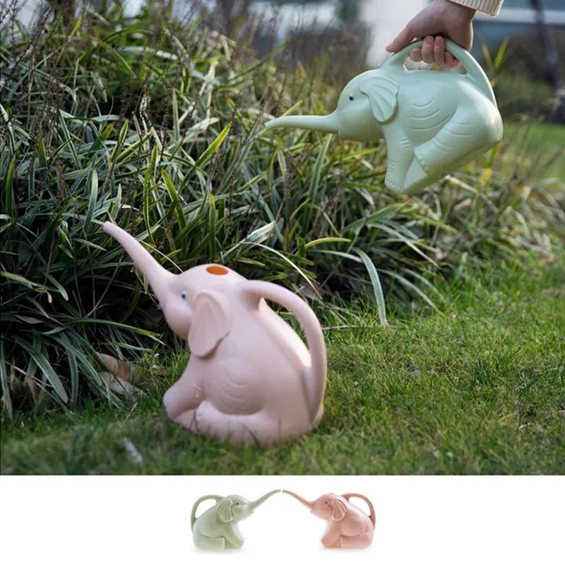 Baby elephant watering flowers - soilcommander